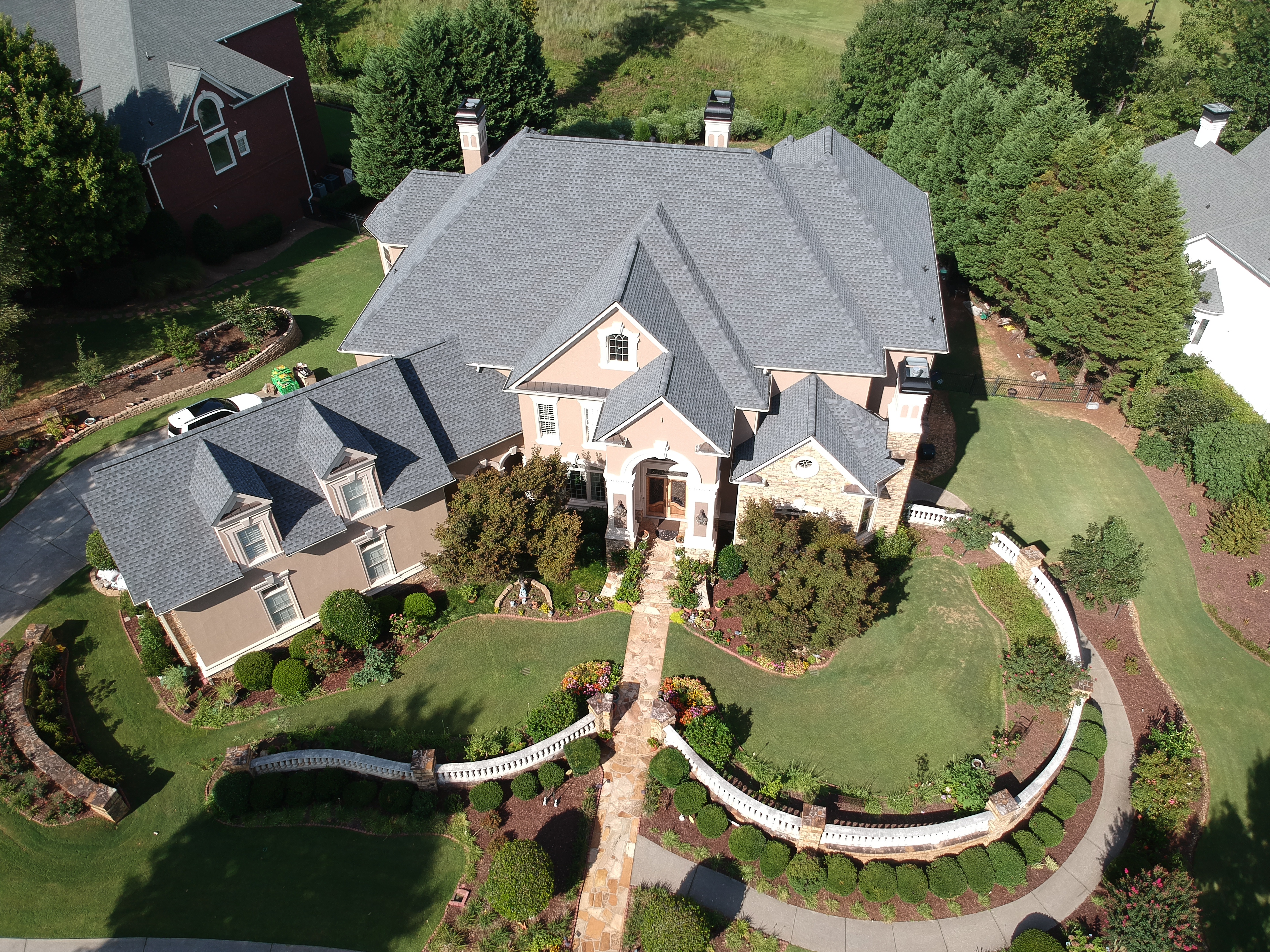 Completed roof replacement in Atlanta neighborhood after storm damage restoration